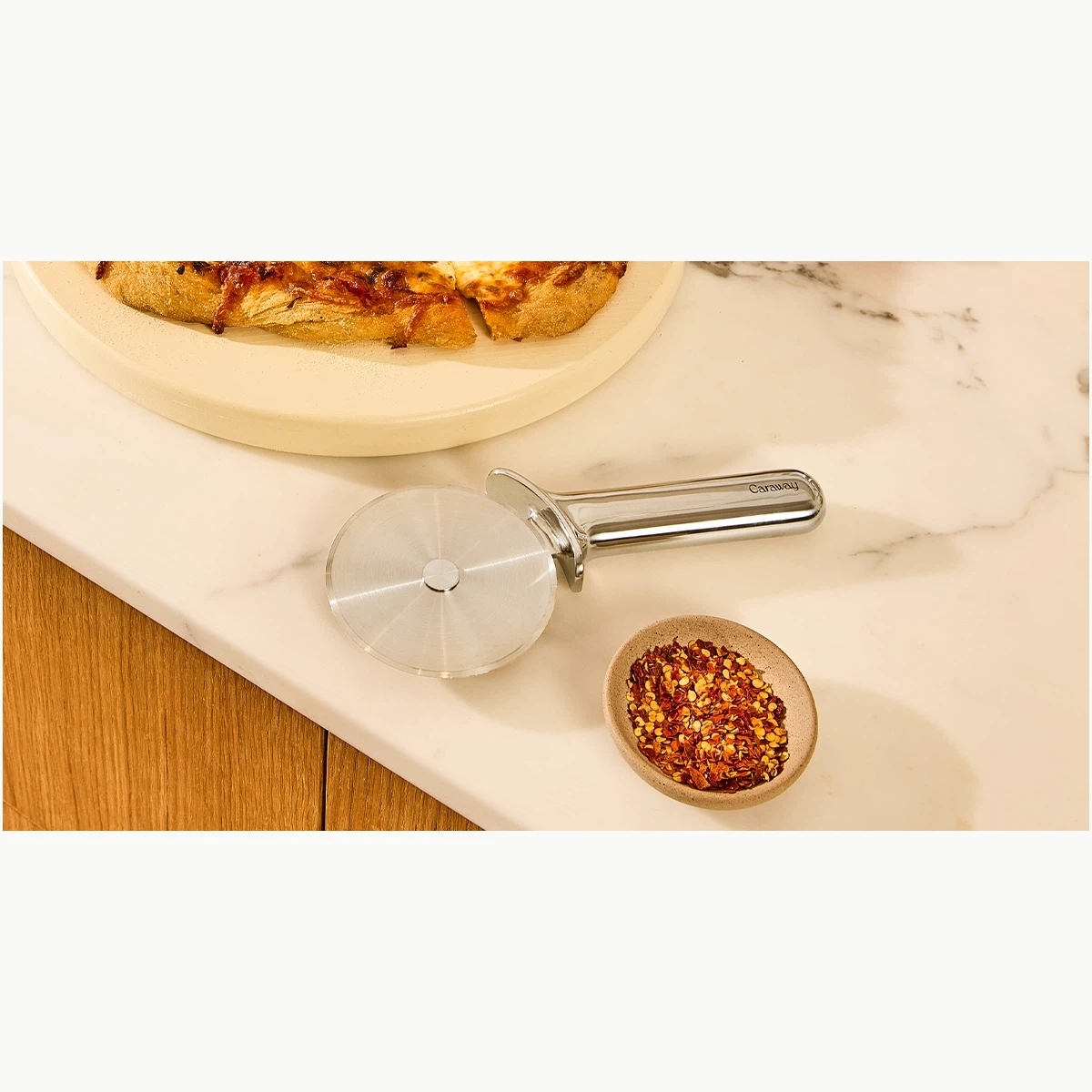 caraway-premium-stainless-steel-pizza-cutter-ergonomic-sharp-blade-non-toxic-off image 1